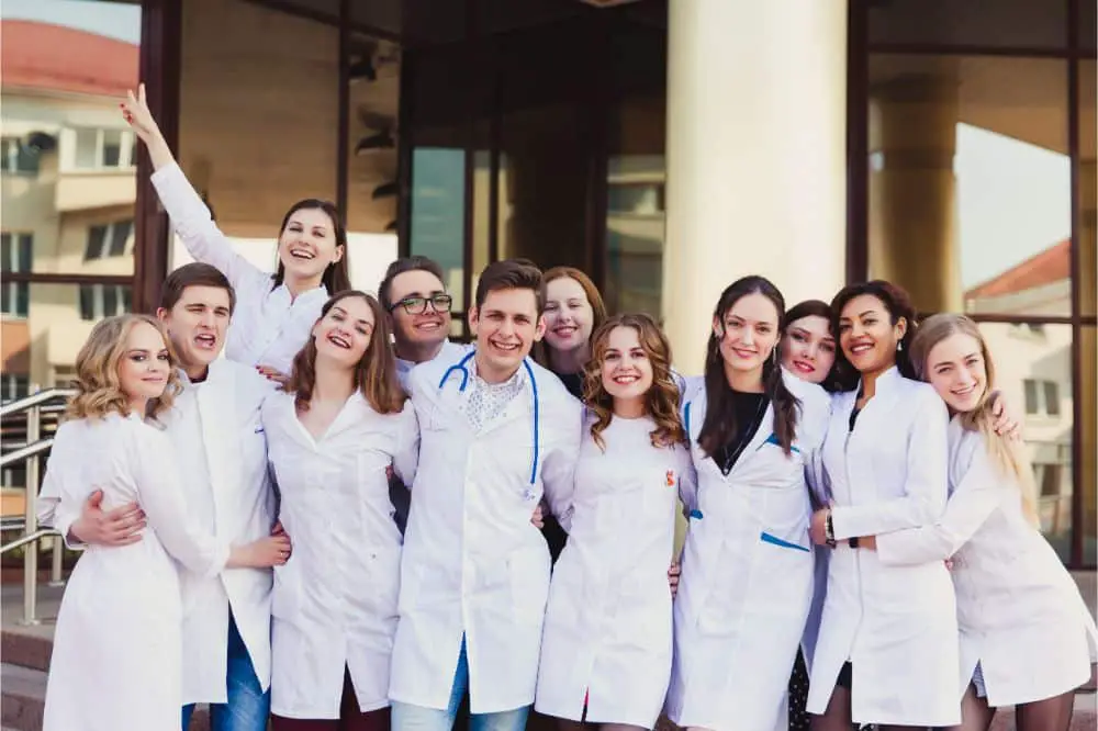 group of medical interns on the background of the hospital